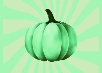 The pumpkin in the picture appears to glow a lime green with yellow-green swirls extending outward from it and is on a green background.