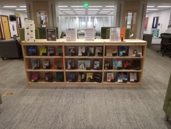 The library's central bookcase with the books which are part of the Spotlight on Censorship display.